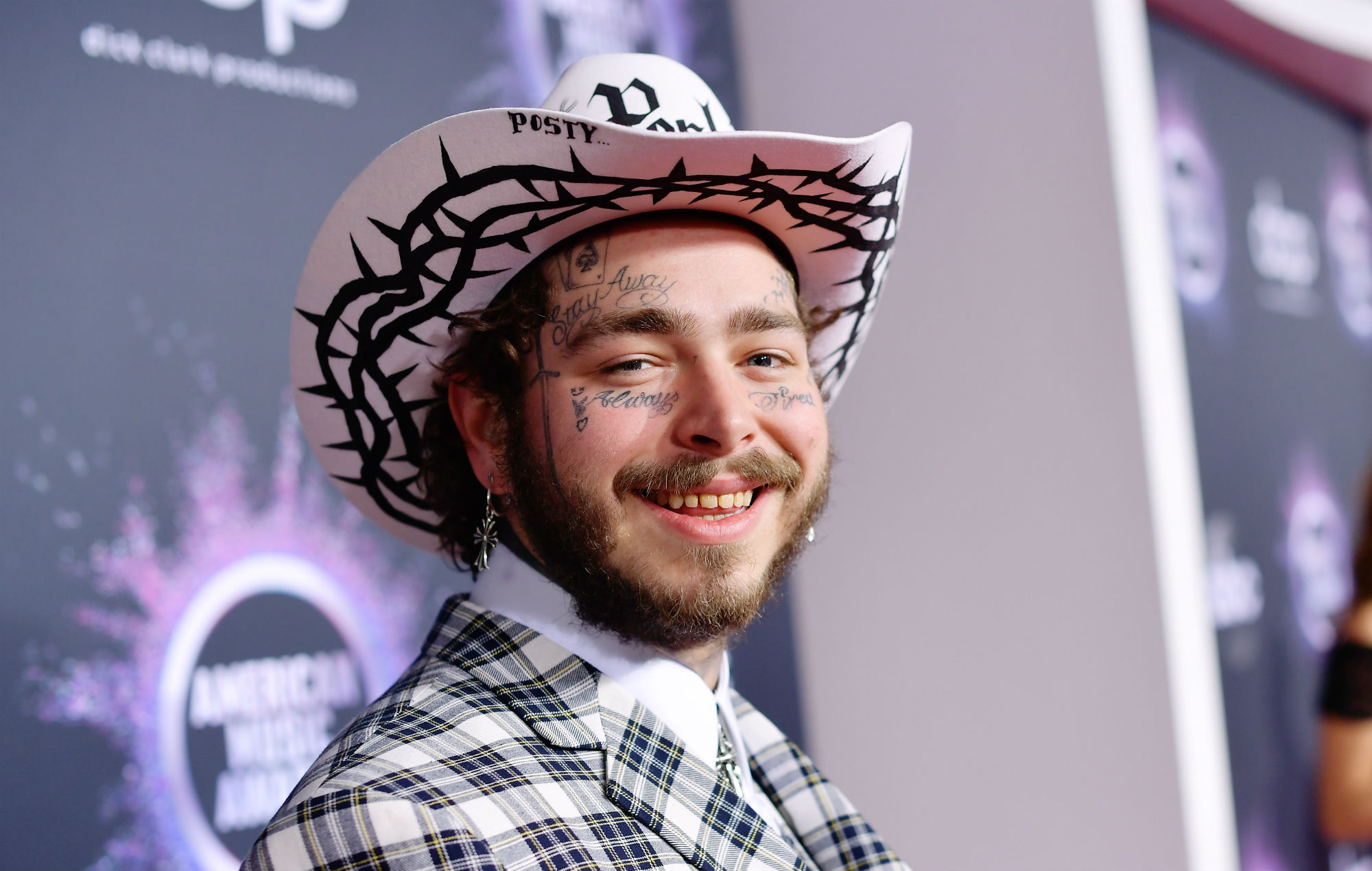Watch Post Malone star in the trailer for Mark Wahlberg&rsquo;s new Netflix movie &lsquo;Spenser Confidential&rsquo;