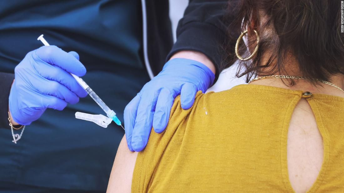 Experts say it’s a race between coronavirus variants and vaccines in the US as air travel hits records