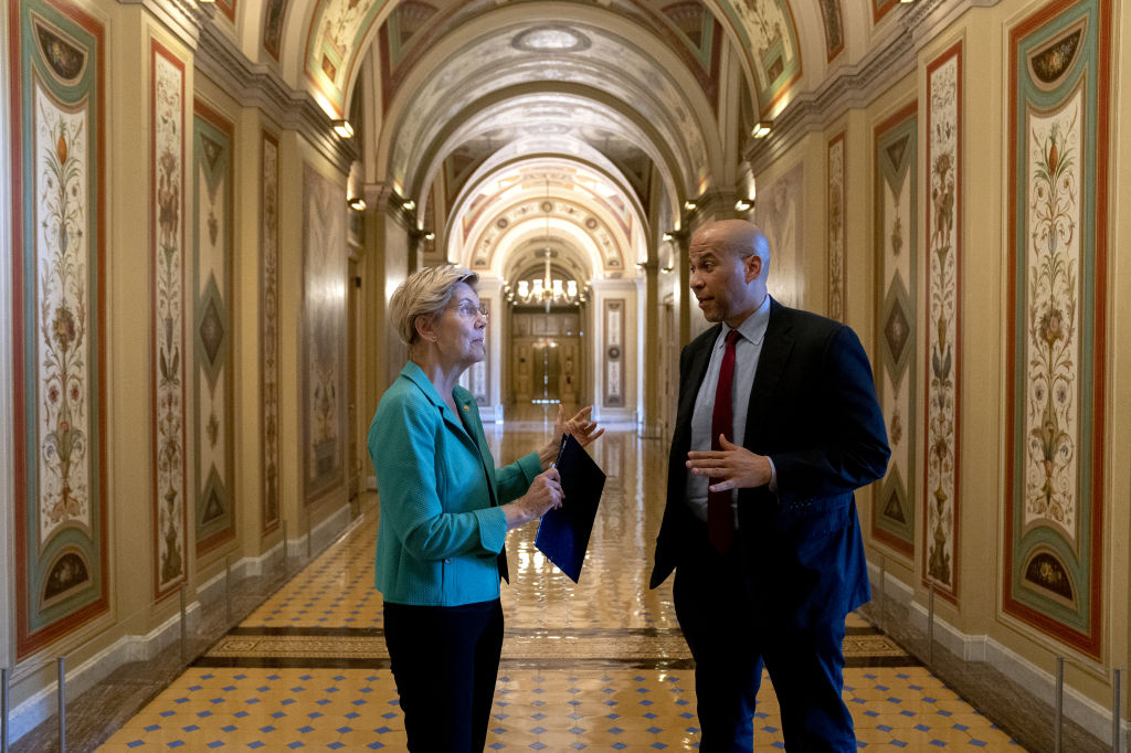 Sens. Warren and Booker Test Positive for COVID-19, Despite Booster Shots