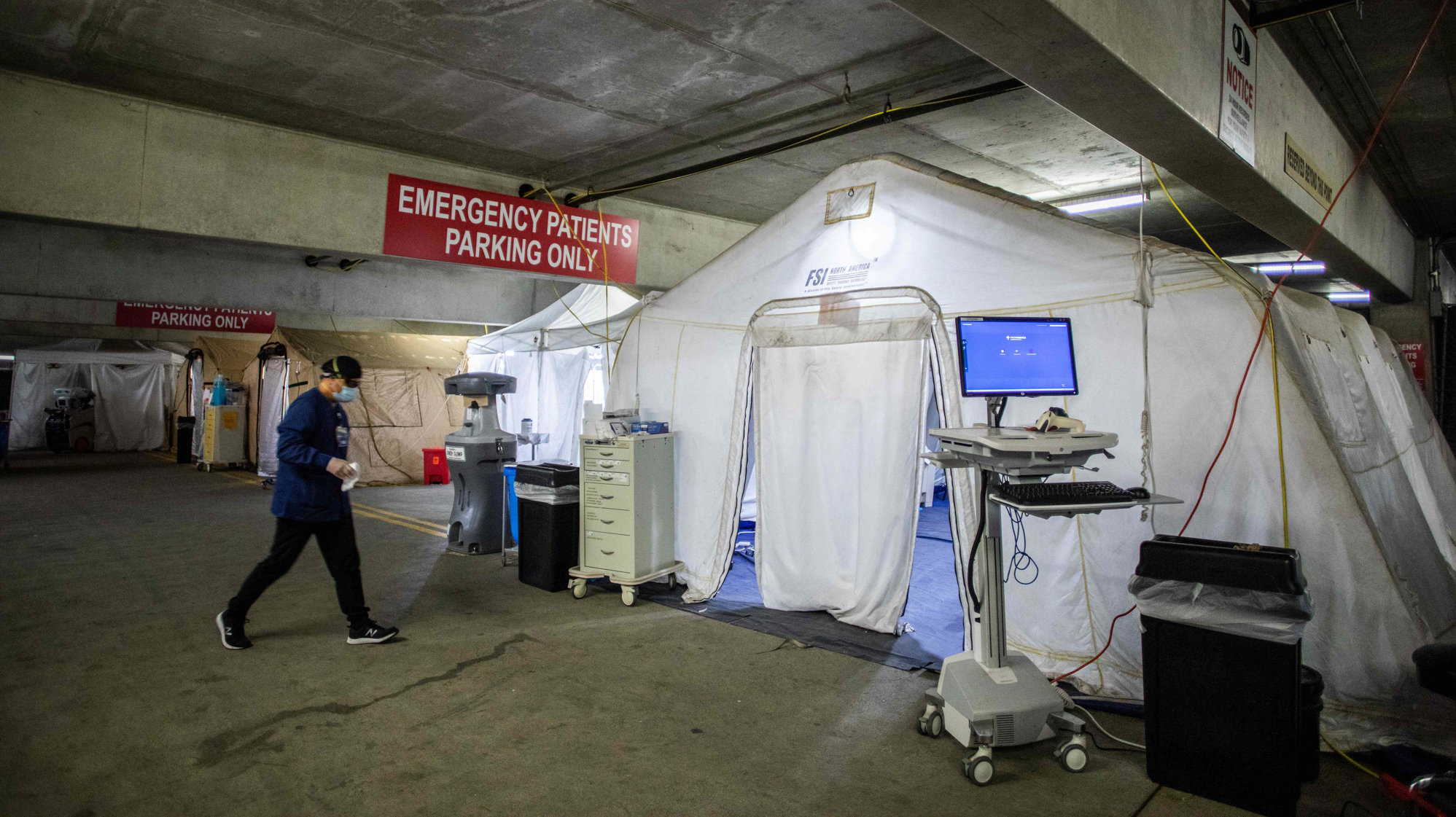 ERs are overwhelmed as omicron continues to flood them with patients